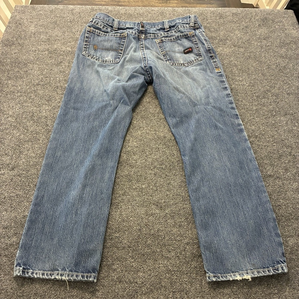 Ariat M4 Relaxed Boot Workwear Faded FR Denim Jeans Mens 36x30 Ripped - Picture 9 of 10